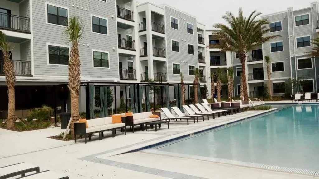 Painted apartment community courtyard and pool in Gainesville, FL