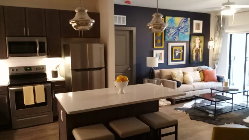 Interior painting of a living room and kitchen in Gainesville, FL