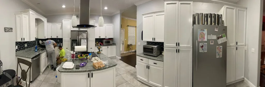 Sprayed white kitchen cabinets in Gainesville, FL